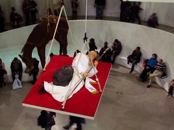 Even profaner: Cattelan's sculpture of Pope John Paul getting hit by a meteor. The sculpture is titled 'La Nona Ora,' and was made in 1999.